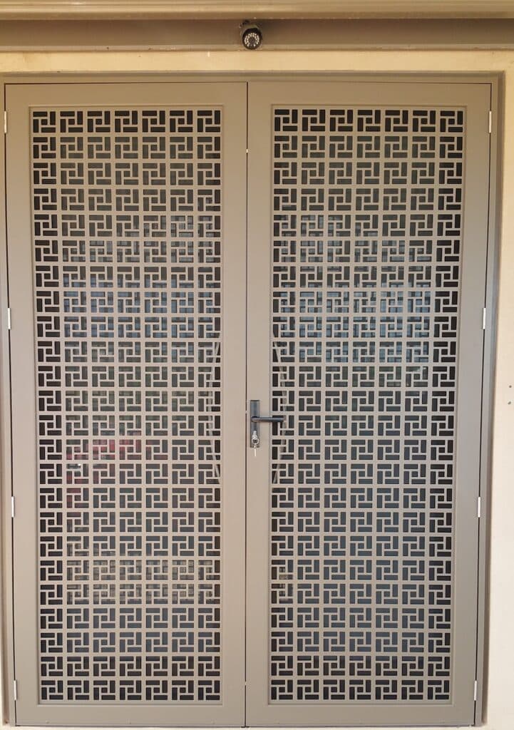 Security door installation — colonial casting